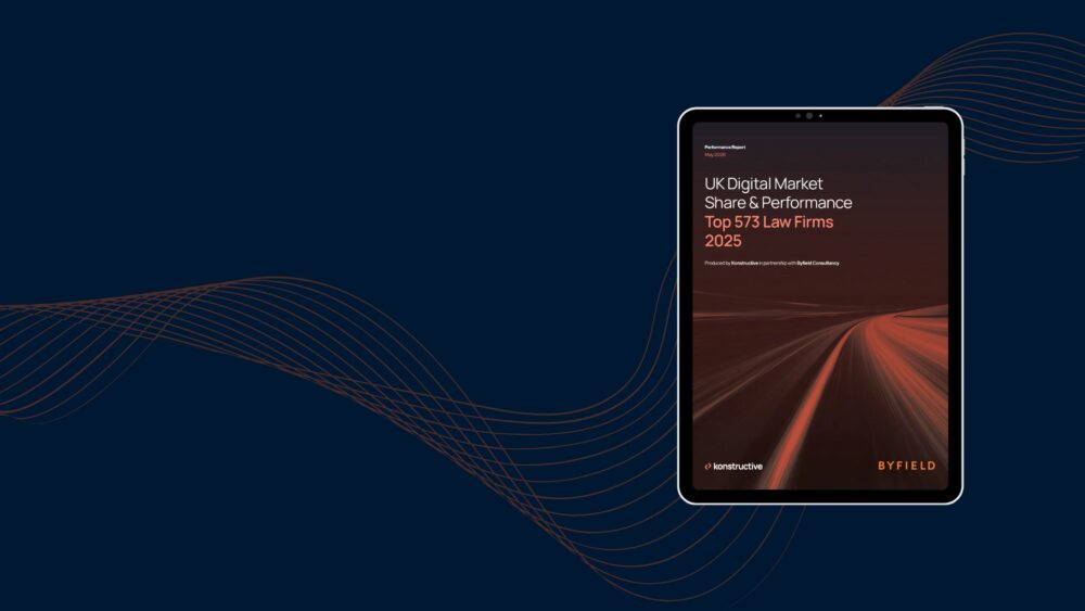 Cover of UK Digital Market Share & Performance 2025 report on a tablet screen, featuring Konstructive and Byfield branding with a stylised motion light road graphic.